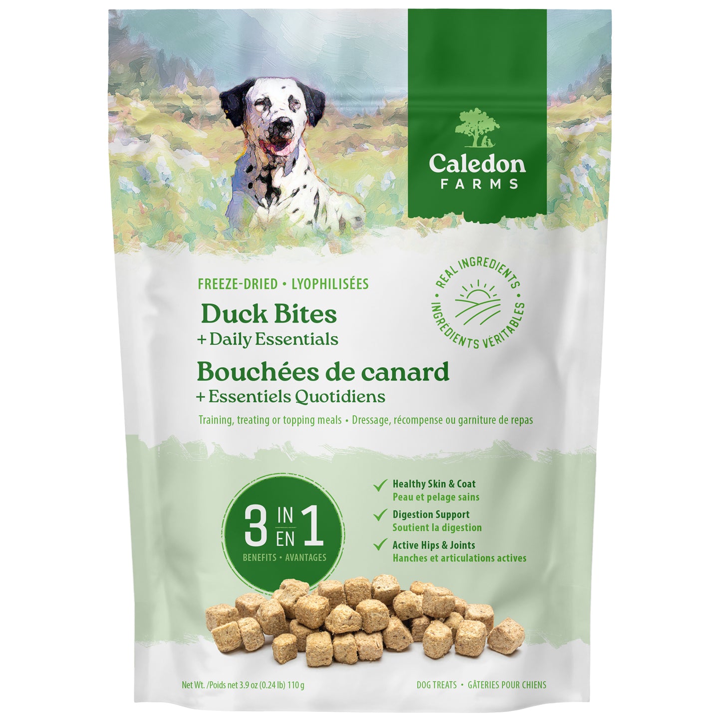 A bag of Caledon Farms Duck Bites + Daily Essentials 110g freeze-dried dog treats features a Dalmatian on the package and highlights 3-in-1 benefits for skin, gut, and joint health, with bite-sized pieces at the bottom.